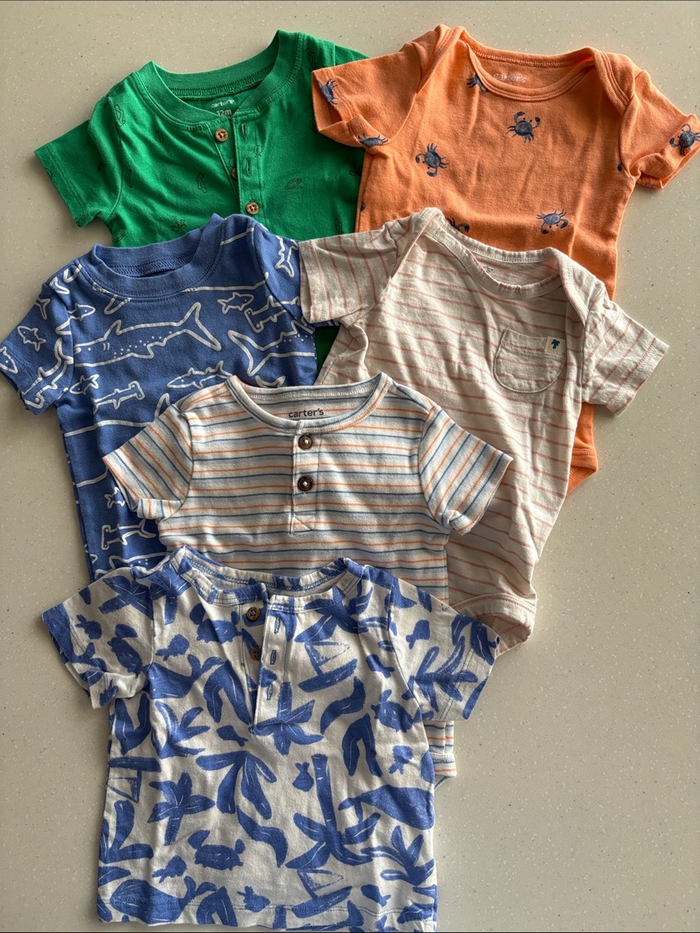 5 Carter's Multi-Color Short Sleeve Baby Onsies and 1 Henley Shirt